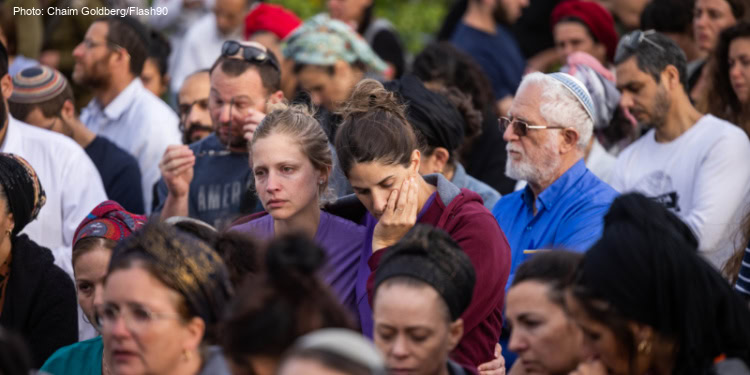Crowd mourns death of mother
