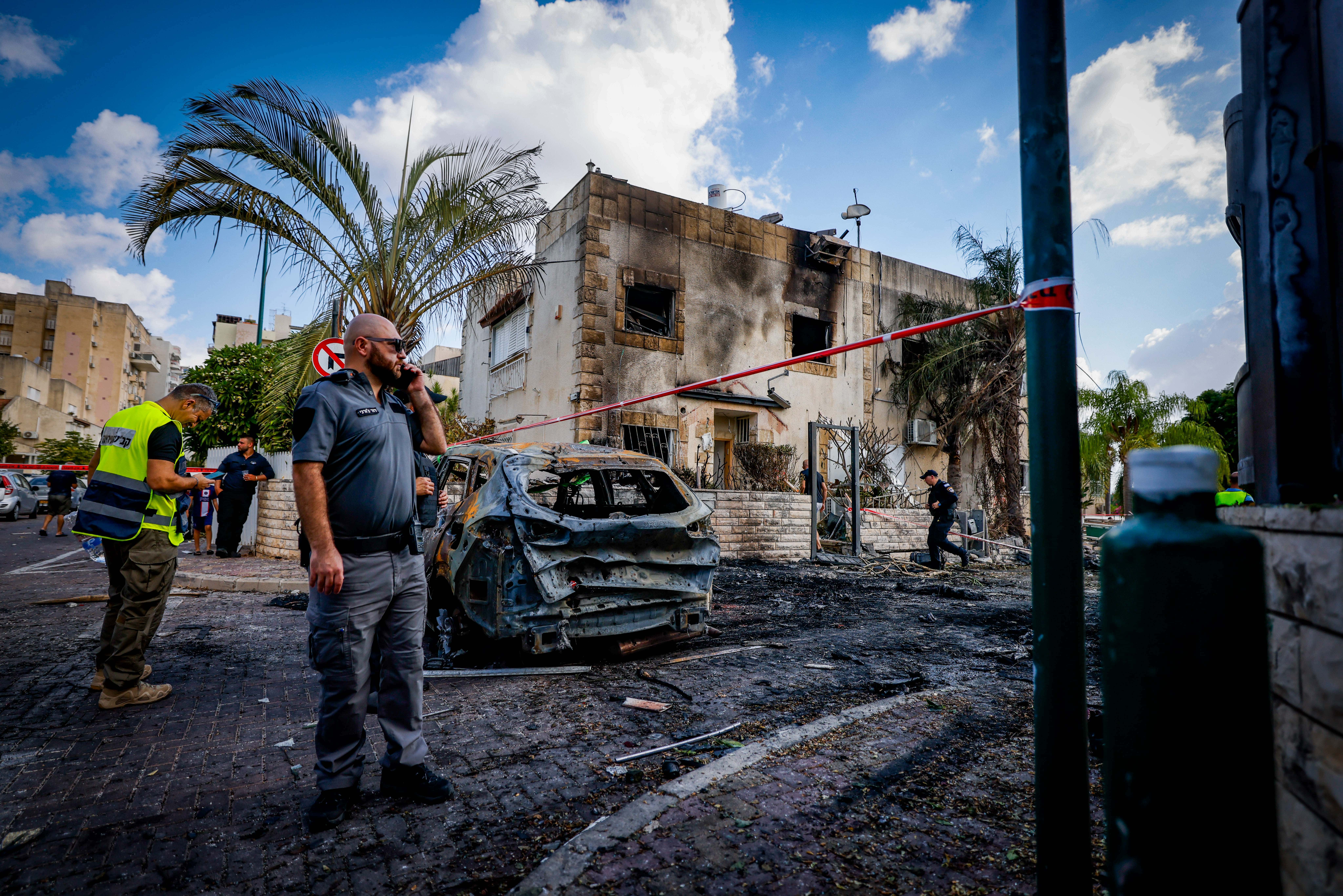 The site where a missile fired from Lebanon hit houses and cars in Kiryat Bialik, northern Israel,