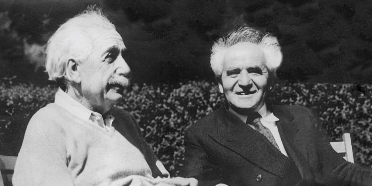 Albert Einstein on the left