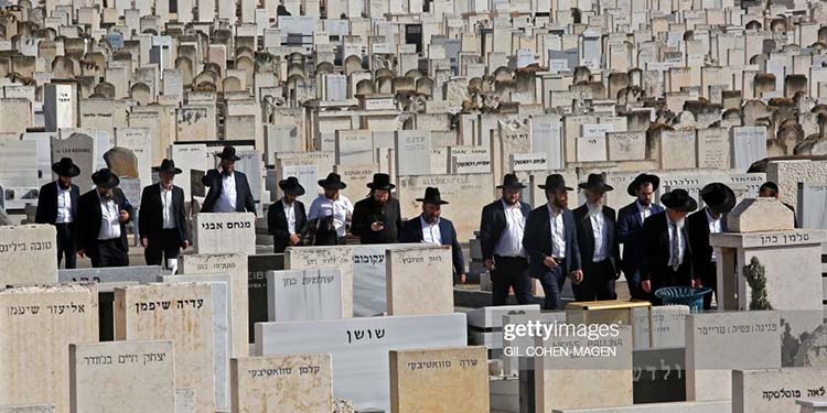 Ultra-Orthodox Jews attend the funeral of one of the victims of Meron stampede at Segula cemetery in Petah Tikva