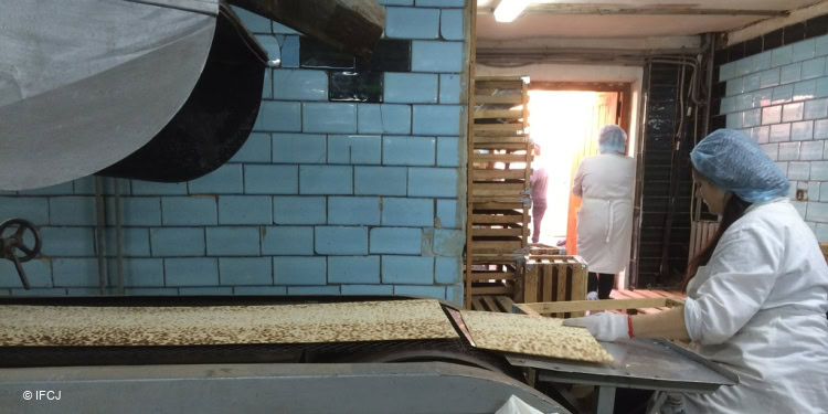 Woman making Matzah